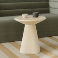 Table d'appoint minimaliste en béton ivoire avec plateau lisse et courbes douces pour le salon