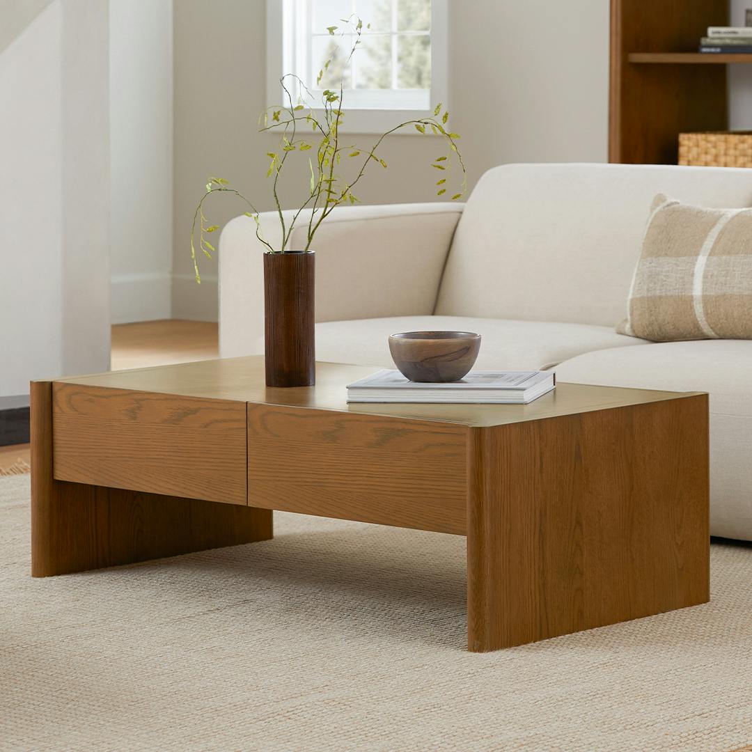 Table basse scandinave en chêne fumé avec grand tiroir de rangement et plateau rond pour le salon