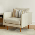 Fauteuil de salon contemporain en tissu ivoire avec coussins garnis de fibres et pieds en bois massif pour salon