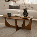 Table basse moderne en chêne fumé avec piètement arqué sculptural et bords biseautés pour le salon