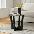 Table d'appoint moderne noire en bois massif avec base sculpturale en arche et bords biseautés pour le salon